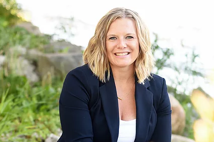 Kristin Burkart: Veteran-owned real estate broker specializing in Ozaukee County, with over 200 transactions and a passion for helping families find their dream homes.