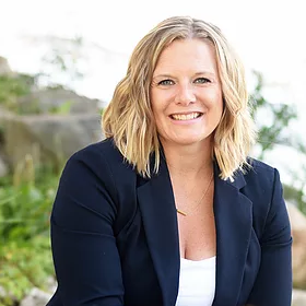 Kristin Burkart: Veteran-owned real estate broker specializing in Ozaukee County, with over 200 transactions and a passion for helping families find their dream homes.